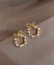 Fashion Gold Copper Alloy Pearl Bow Stud Earrings