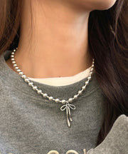 Fine Silk Stainless Steel Pearl Bow Pendant Necklace