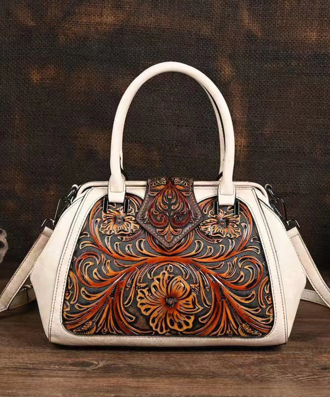 Retro Apricot Colored Cowhide Handmade Carved Handbag