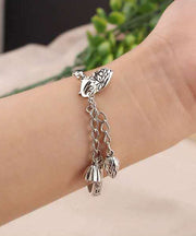 Retro Silk Sterling Silver Graphic Lotus Tassel Bangle