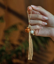 Vintage Yellow Hand Woven Peach Wood Olivary Nucleus Tassel Keychains