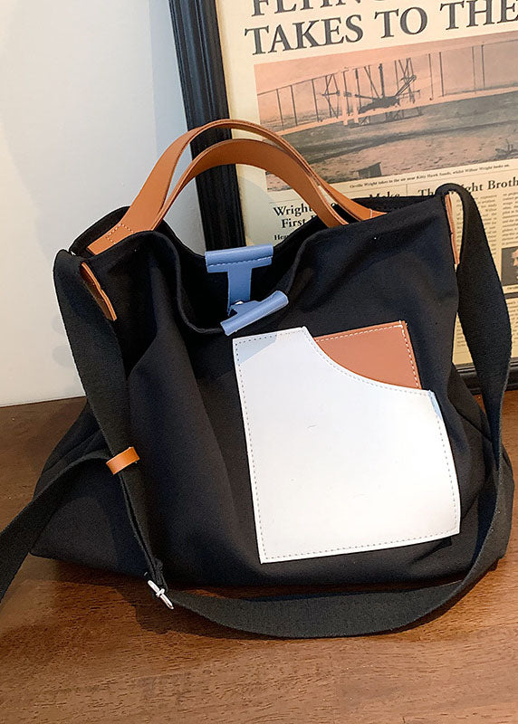 Schicke, schwarze, solide Canvas-Taschenhandtasche