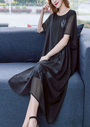 Moderne schwarze O-Neck-Blumendruck-drapierende Chiffon-Kleider mit kurzen Ärmeln