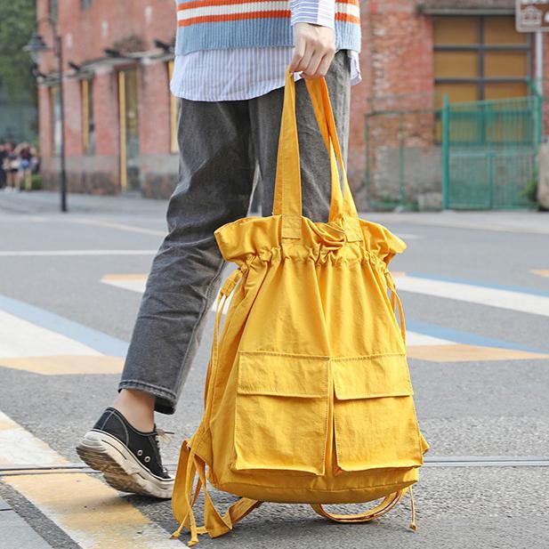 New outfit Design Double Front Pockets Simple Drawstring yellow Backpacks - bagstylebliss